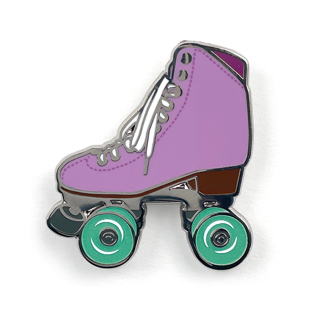 Amethyst roller skate pin with glow in the dark wheels