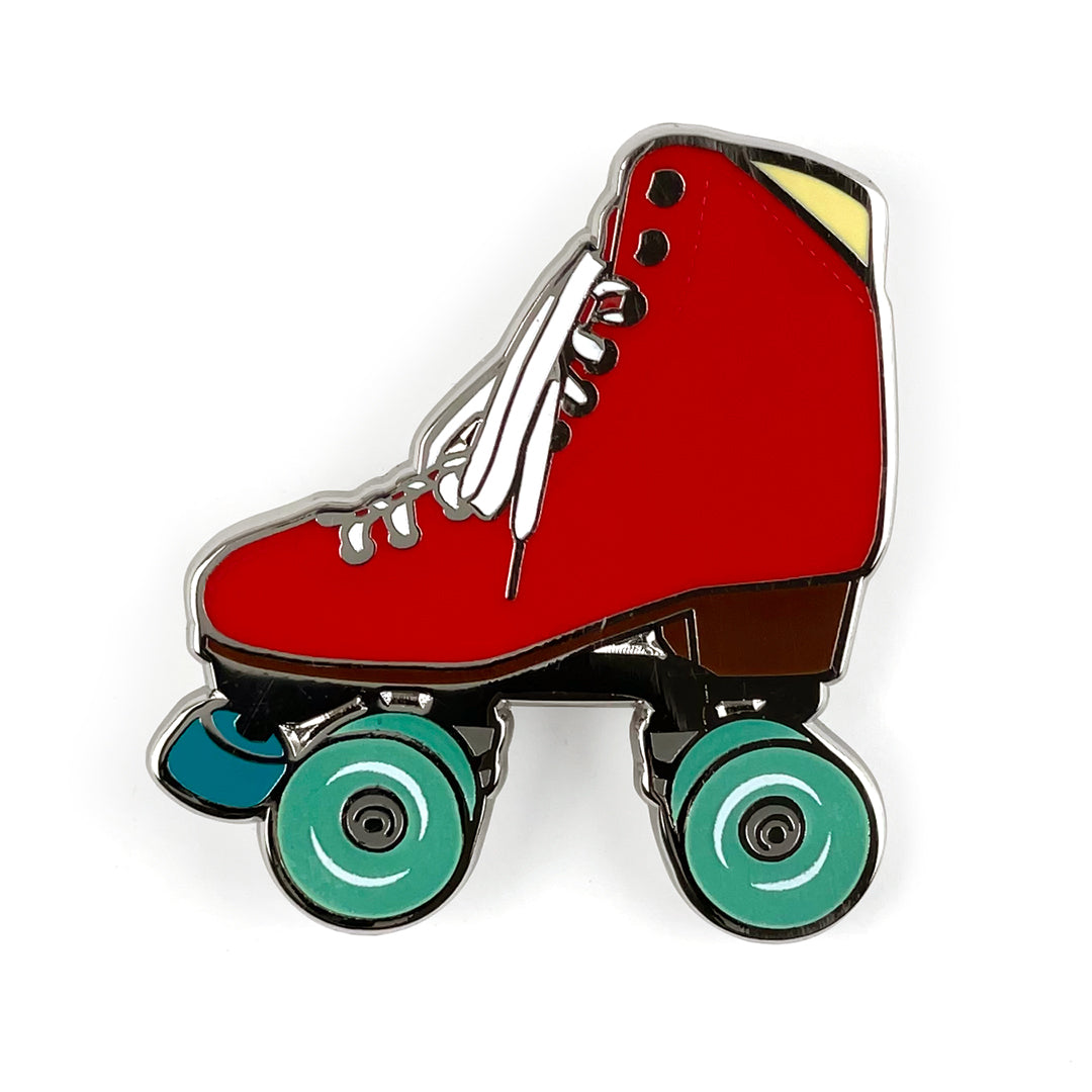 Red roller skate pin with glow in the dark wheels